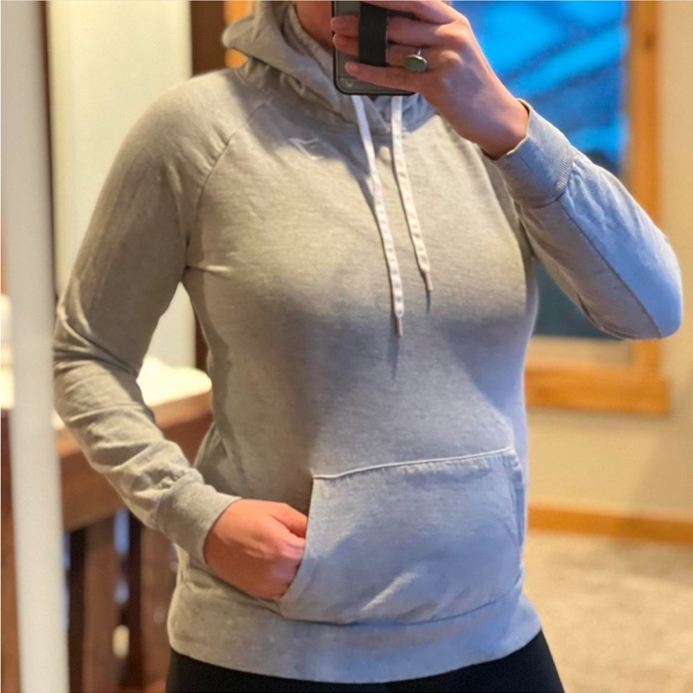 Grey and white GymShark hooded sweatshirt